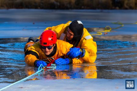 Reno Fire Department's Water Entry Team (WET) conducts an ice safety drill Jan. 5, 2022 at Idlewild Park in Reno, Nev.