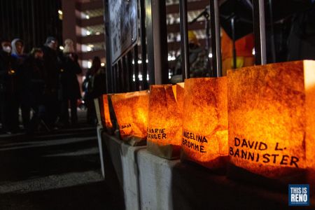 Community members lit candles and luminarias in remembrance of people who died homeless during a vigil Feb. 23, 2022 in Reno, Nev. Image: Ty O'Neil / This Is Reno