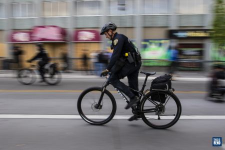a Reno Police officer on a bike