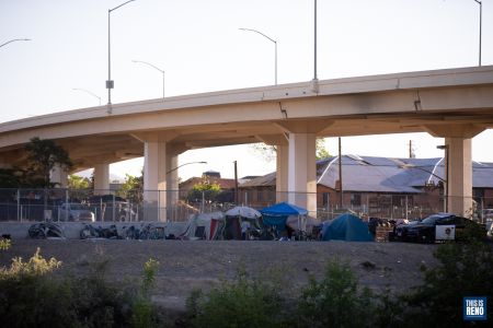 Reno Police launched an early morning cleanup of a homeless encampment in downtown Reno. Image: Isaac Hoops