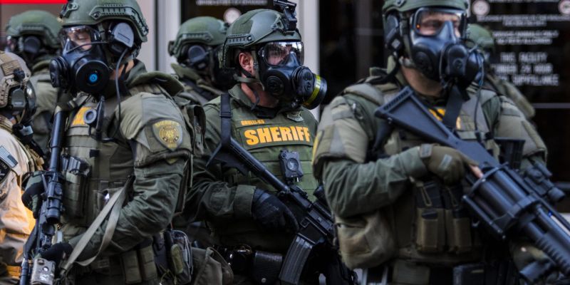 Washoe County Sheriff's deputies arrived in full tactical gear to assist Reno Police officers in downtown Reno. Image: Ty O'Neil