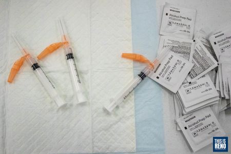 Supplies to administer the COVID-19 vaccine. Image: Ty O'Neil / This Is Reno.