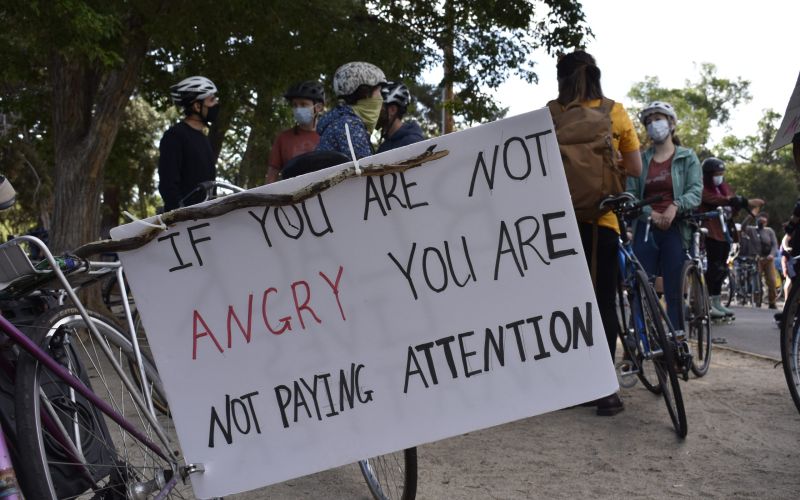 A protest sign on a bike during a Black Lives Matter protest ride.