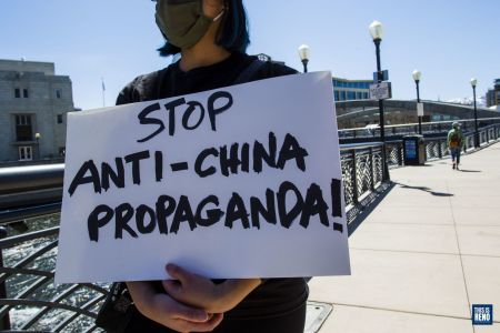 Demonstrators gather at City Plaza in Reno, Nev., for the National Day of Action against anti-Asian violence and China bashing on March 27, 2021. Image: Ty O'Neil / This Is Reno