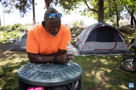 People displaced from a downtown Reno homeless camp had a picnic lunch at Brodhead Memorial Park. Image: Isaac Hoops