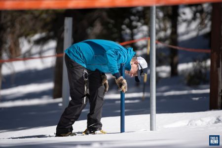 Natural Resources Conservation Service Hydrologist Jeff Anderson measures the Sierra snowpack on March 1, 2021. Image: Isaac Hoops / This Is Reno