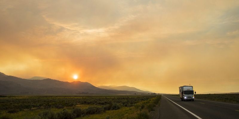 Smoke from the Beckwourth Complex fire drifts east across Highway 395 north of Reno, Nev. on July 14, 2021.