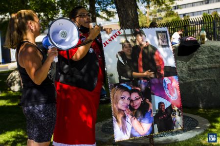 Family members of people killed by police protest outside of the Bruce R. Thompson Courthouse and Federal Building on Sept. 12, 2021 in Reno, Nev.