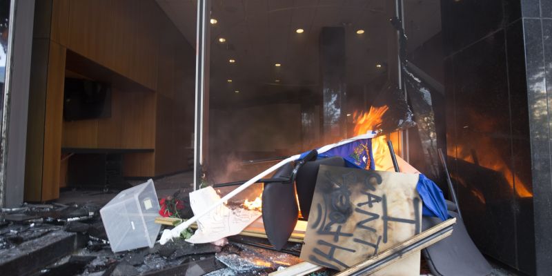 Protesters set fire at City Hall. Image: Trevor Bexon