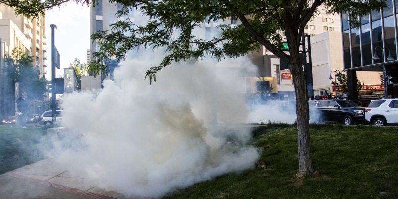 Tear gas is deployed to move rioters away from City Hall. Image: Ty O'Neil