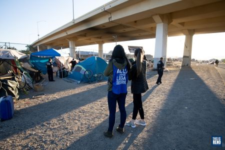 ACLU volunteers were on site at an early morning cleanup of a homeless encampment in downtown Reno. Image: Isaac Hoops