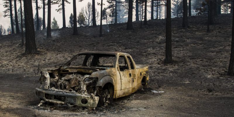 Burned vehicle from the Tamarack Fire. Image by Ty O'Neil for This Is Reno, July 17, 2021.