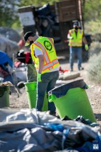 A private clean-up crew was hired by NDOT to remove a homeless camp near Interstate 80 on June 2, 2020. Image: Eric Marks