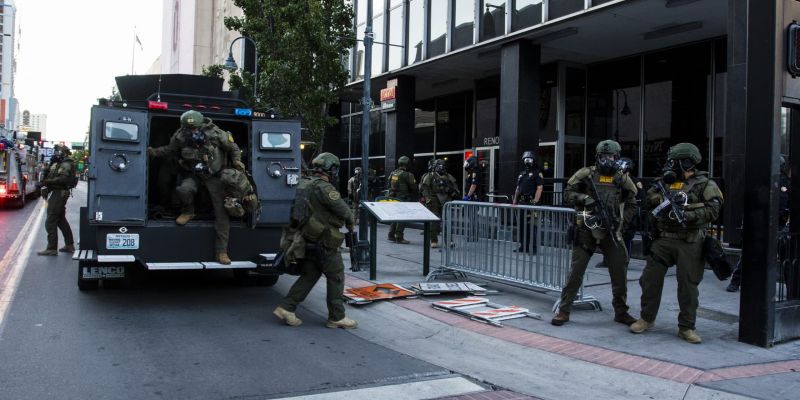 Multiple units from the Washoe County Sheriff's Office SWAT team arrived in downtown Reno to assist Reno Police. Image: Ty O'Neil