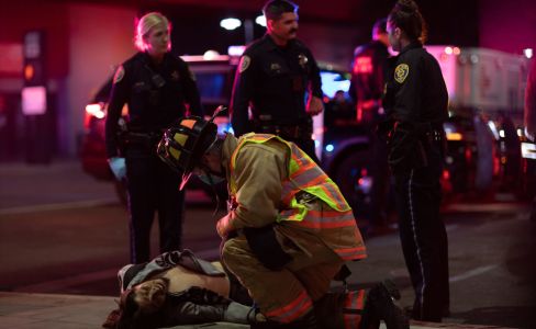 A man collided with an RPD vehicle after running into traffic in downtown Reno Saturday night. Image: Eric Marks
