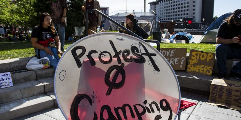 Advocates protested homeless camp sweeps at City Plaza on June 7, 2021. Image: Ty O'Neil / This Is Reno
